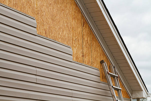 Professional Storm Damage Siding Repair technician working in Granby, CO